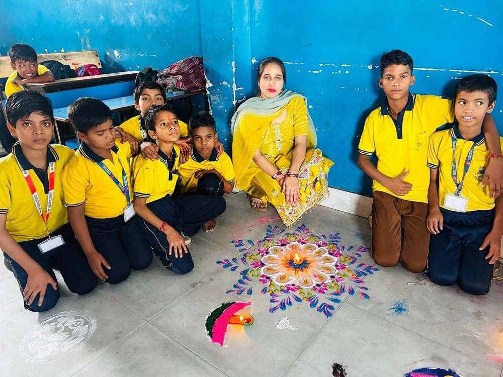 Peacock-design rangoli made by students
