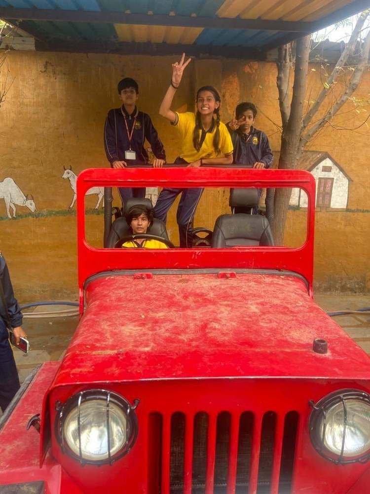 Students enjoying a jeep ride during the school excursion